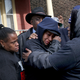 Janet Cooksey, center, the mother of Quintonio LeGrier, during a press conference on Dec. 27, 2015, to speak out about the shooting death of her son by the Chicago police. (Getty Images)